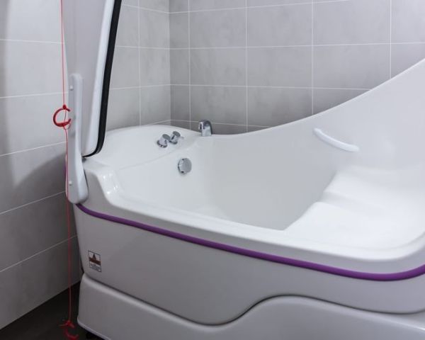 Assisted bath installed in a refurbished bathroom