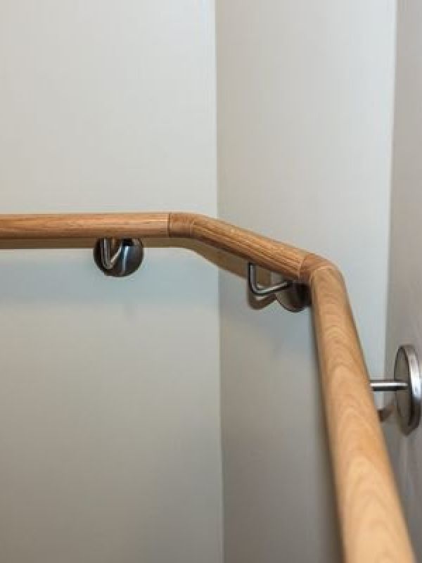 Timber handrail detail on a refurbished stair